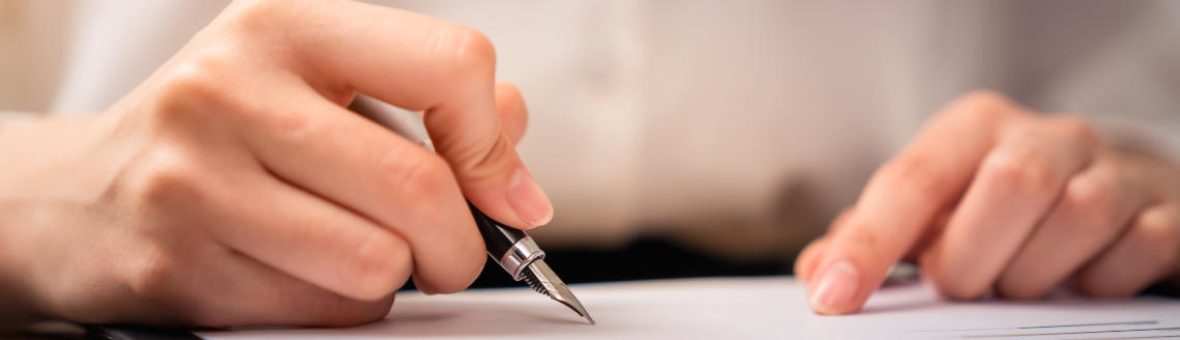 Businessman signing financial contract and hand holding pen putting signature after reaching an agreement. Businessman signing financial contract and hand holding pen putting signature after reaching an agreement.